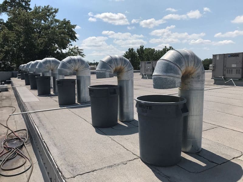 Commercial rooftop dryer vent on a Los Angeles property